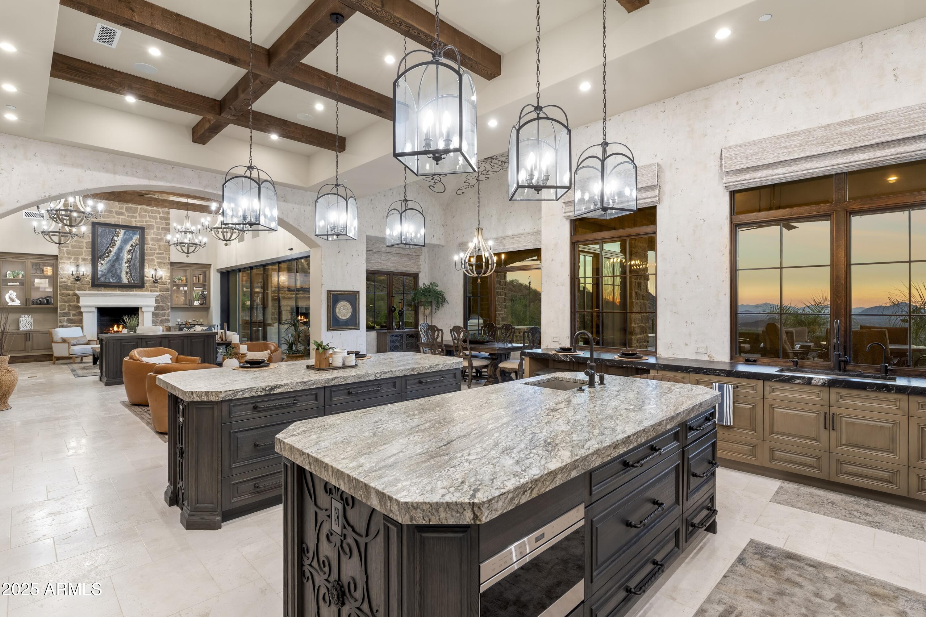 14699 East Paradise Drive, Unit 26 Scottsdale, AZ 85259 - Photo 42 of 73 a kitchen with stainless steel appliances granite countertop a sink and stove