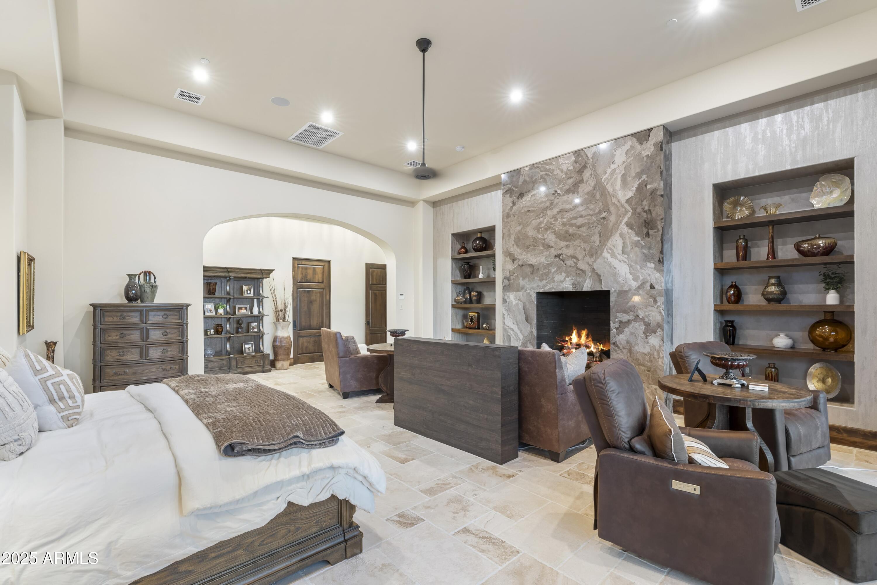 14699 East Paradise Drive, Unit 26 Scottsdale, AZ 85259 - Photo 49 of 73 a bedroom with furniture fireplace and window