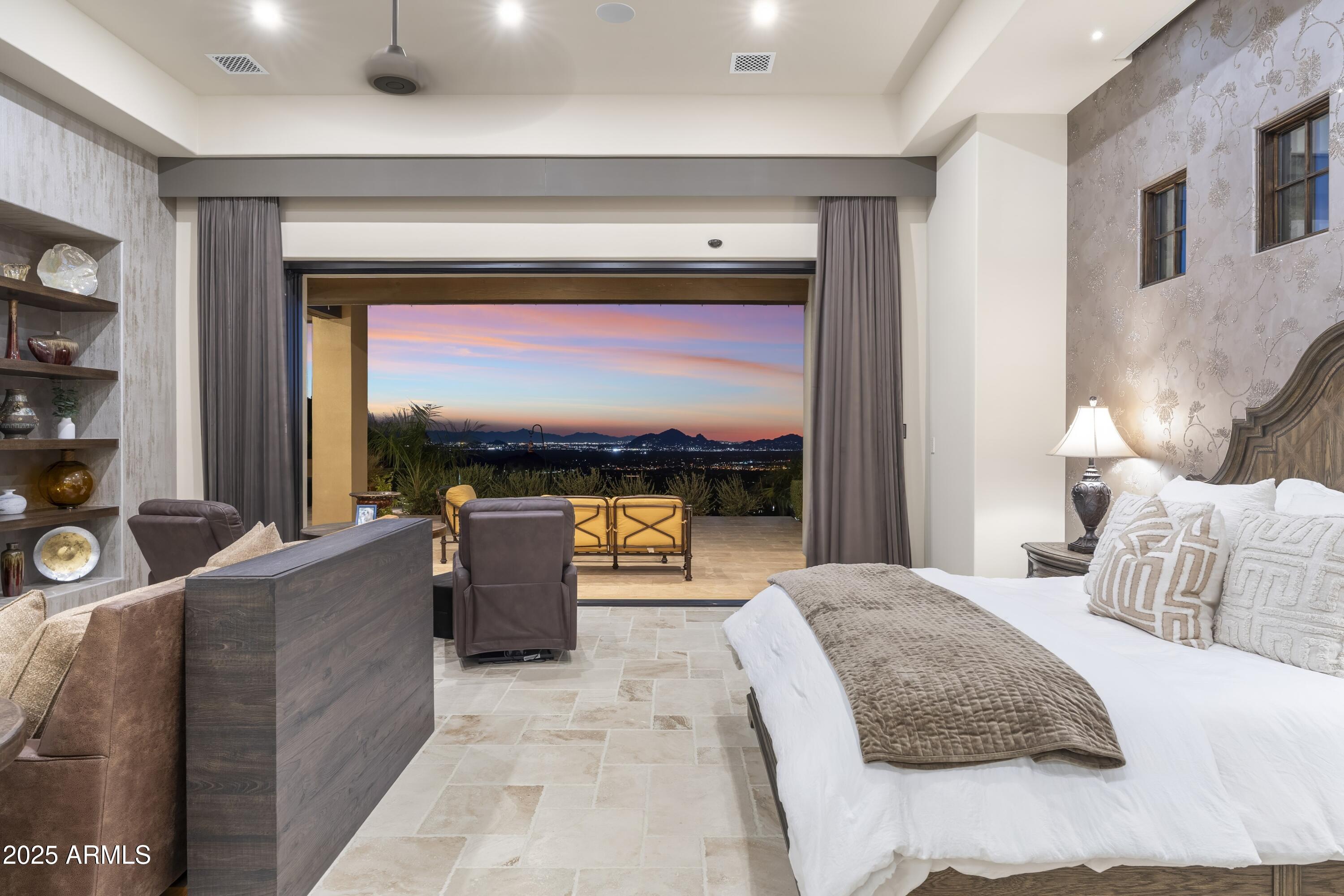 14699 East Paradise Drive, Unit 26 Scottsdale, AZ 85259 - Photo 52 of 73 a bedroom with a large bed and a balcony