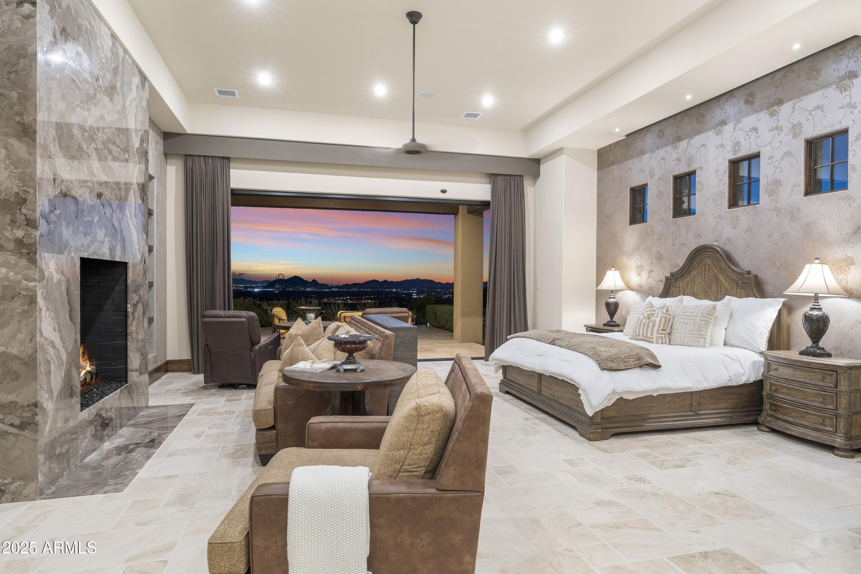 14699 East Paradise Drive, Unit 26 Scottsdale, AZ 85259 - Photo 53 of 73 a living room with furniture a fireplace and a flat screen tv