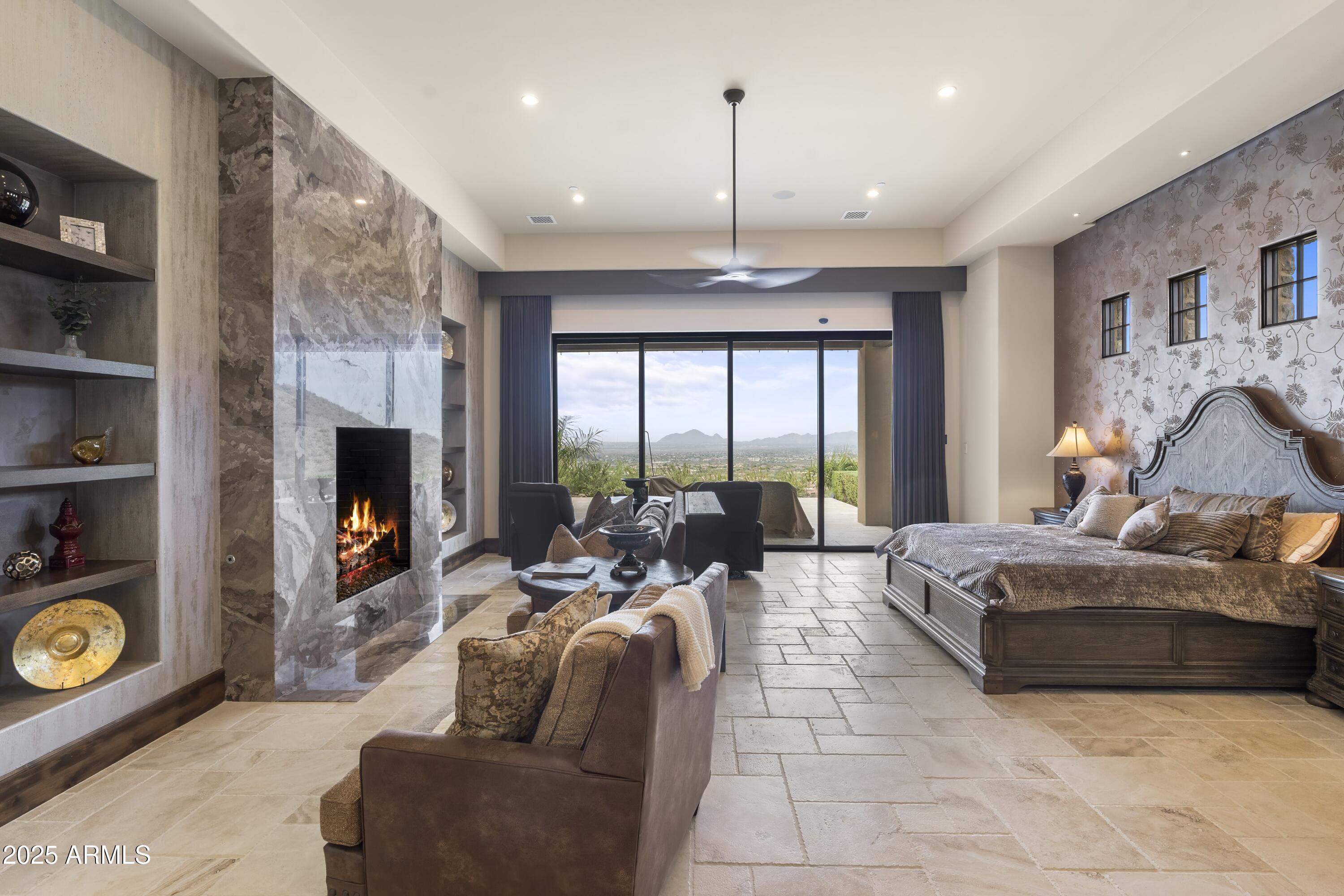 14699 East Paradise Drive, Unit 26 Scottsdale, AZ 85259 - Photo 57 of 73 a living room with furniture fireplace and flat screen tv