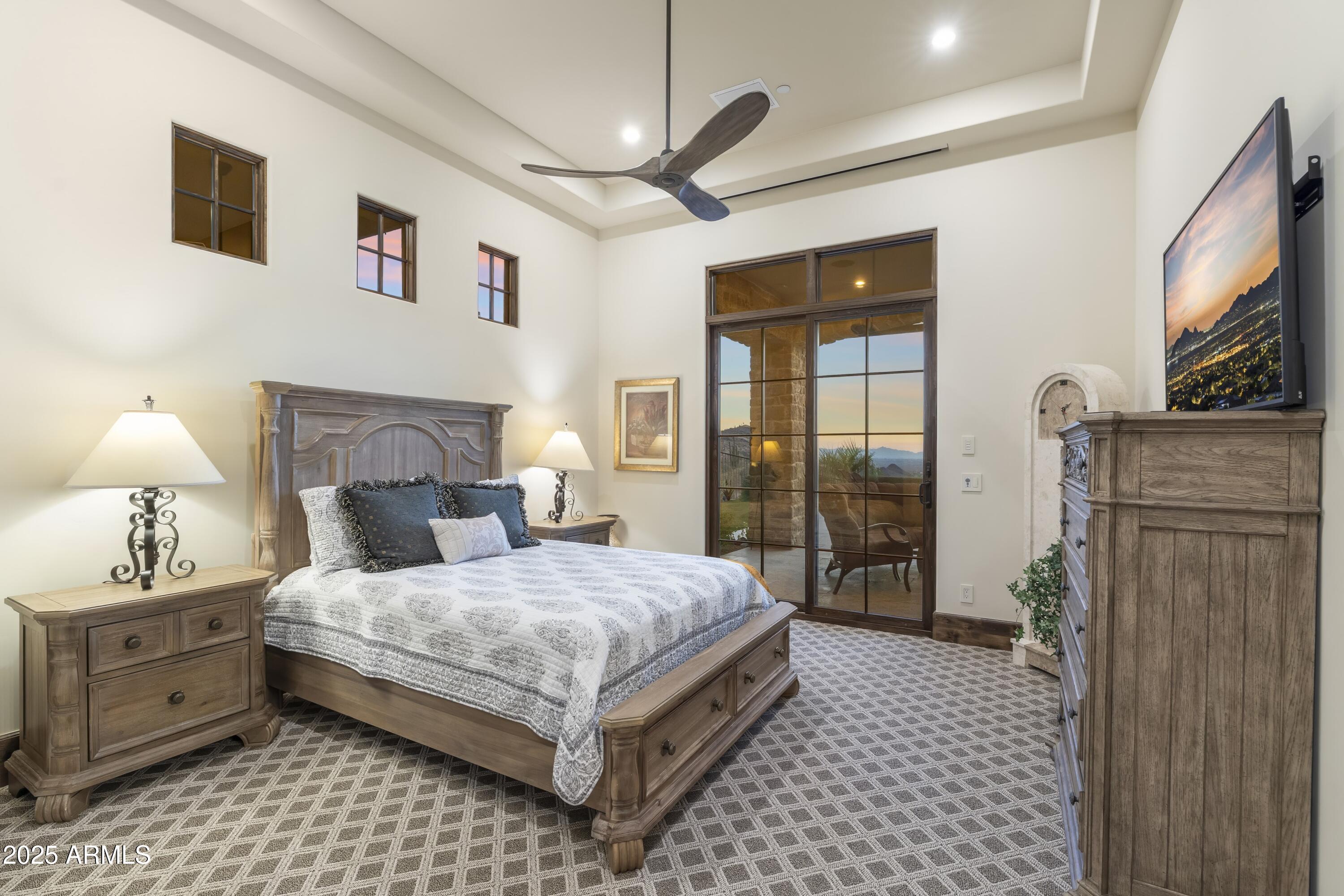 14699 East Paradise Drive, Unit 26 Scottsdale, AZ 85259 - Photo 66 of 73 a bedroom with a bed and a walk in closet