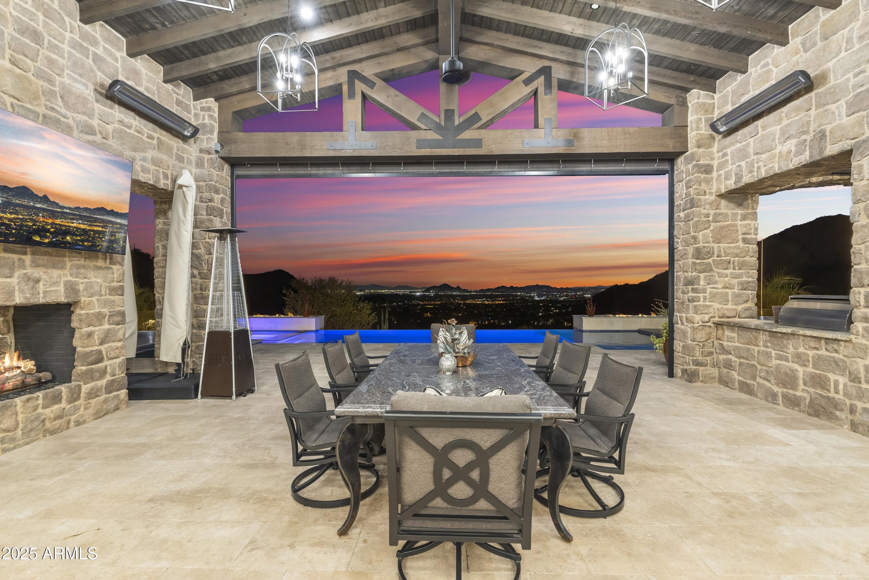 14699 East Paradise Drive, Unit 26 Scottsdale, AZ 85259 - Photo 7 of 73 a view of a chairs and table in a patio