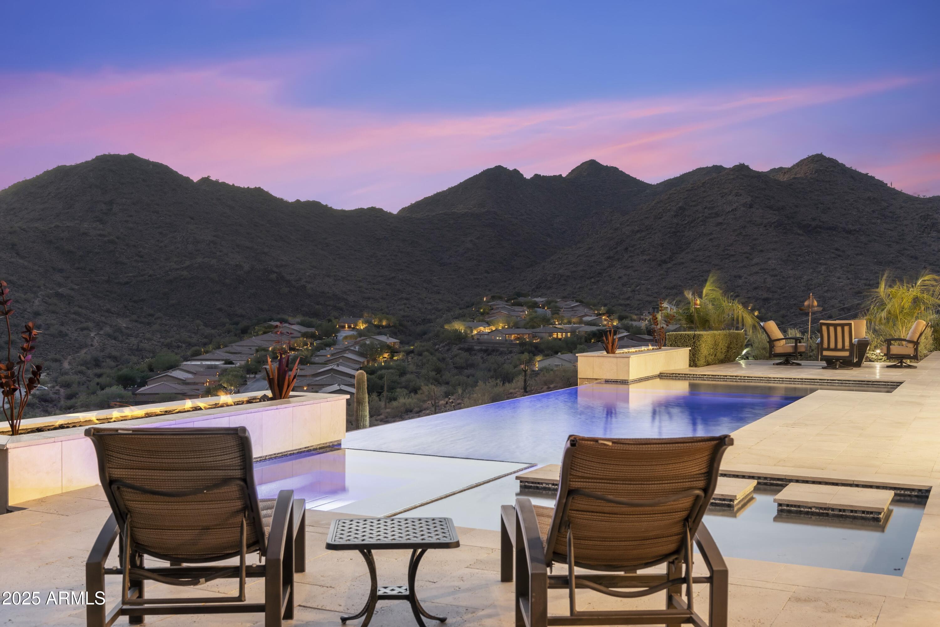 14699 East Paradise Drive, Unit 26 Scottsdale, AZ 85259 - Photo 71 of 73 a view of a terrace with a table and chairs
