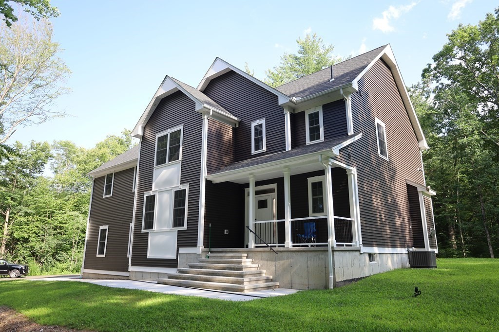 109 North Road Westfield, MA 01085 - Photo 1 of 41 a front view of a house with a yard