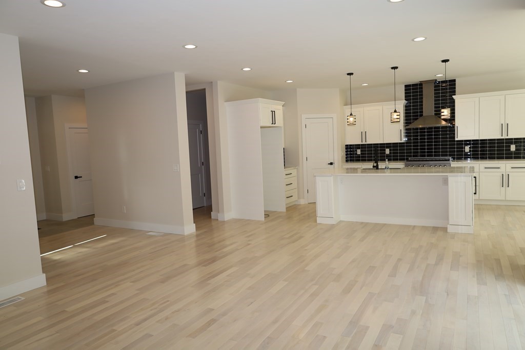 109 North Road Westfield, MA 01085 - Photo 13 of 41 a view of a kitchen with stainless steel appliances a refrigerator and a stove top oven