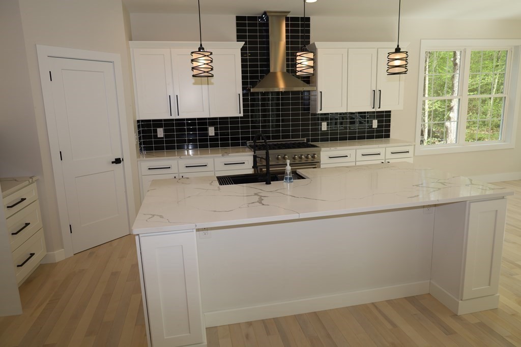 109 North Road Westfield, MA 01085 - Photo 19 of 41 a kitchen with a sink and a refrigerator