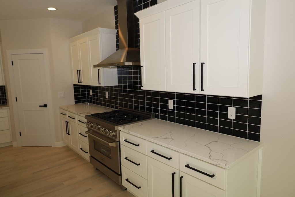 109 North Road Westfield, MA 01085 - Photo 20 of 41 a kitchen with a stove and a cabinet