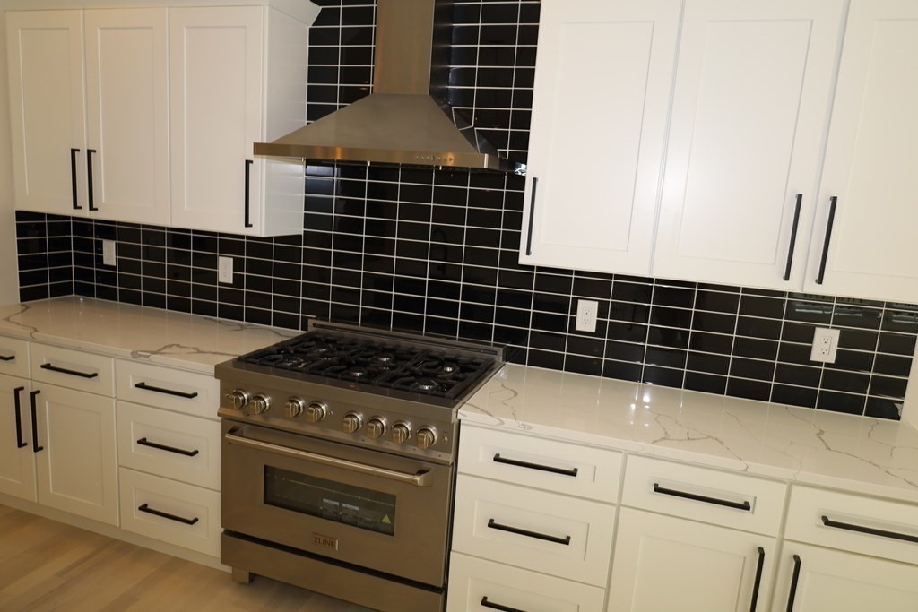 109 North Road Westfield, MA 01085 - Photo 21 of 41 a stove top oven sitting inside of a kitchen