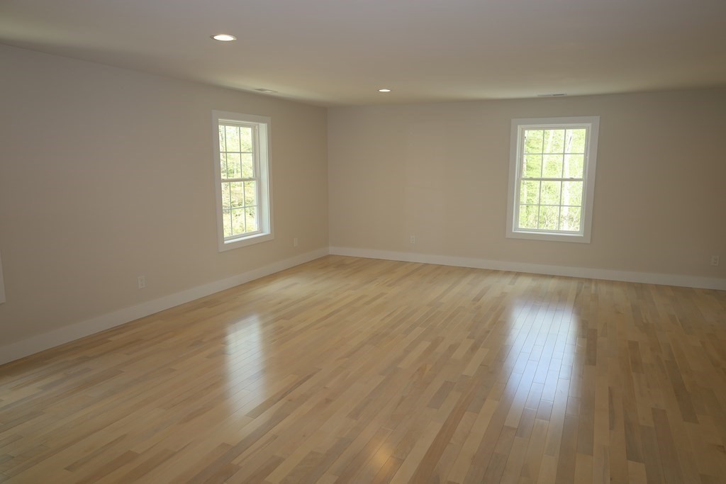 109 North Road Westfield, MA 01085 - Photo 32 of 41 a view of an empty room with wooden floor and window