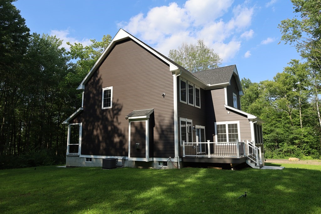 109 North Road Westfield, MA 01085 - Photo 4 of 41 a front view of house with yard and green space