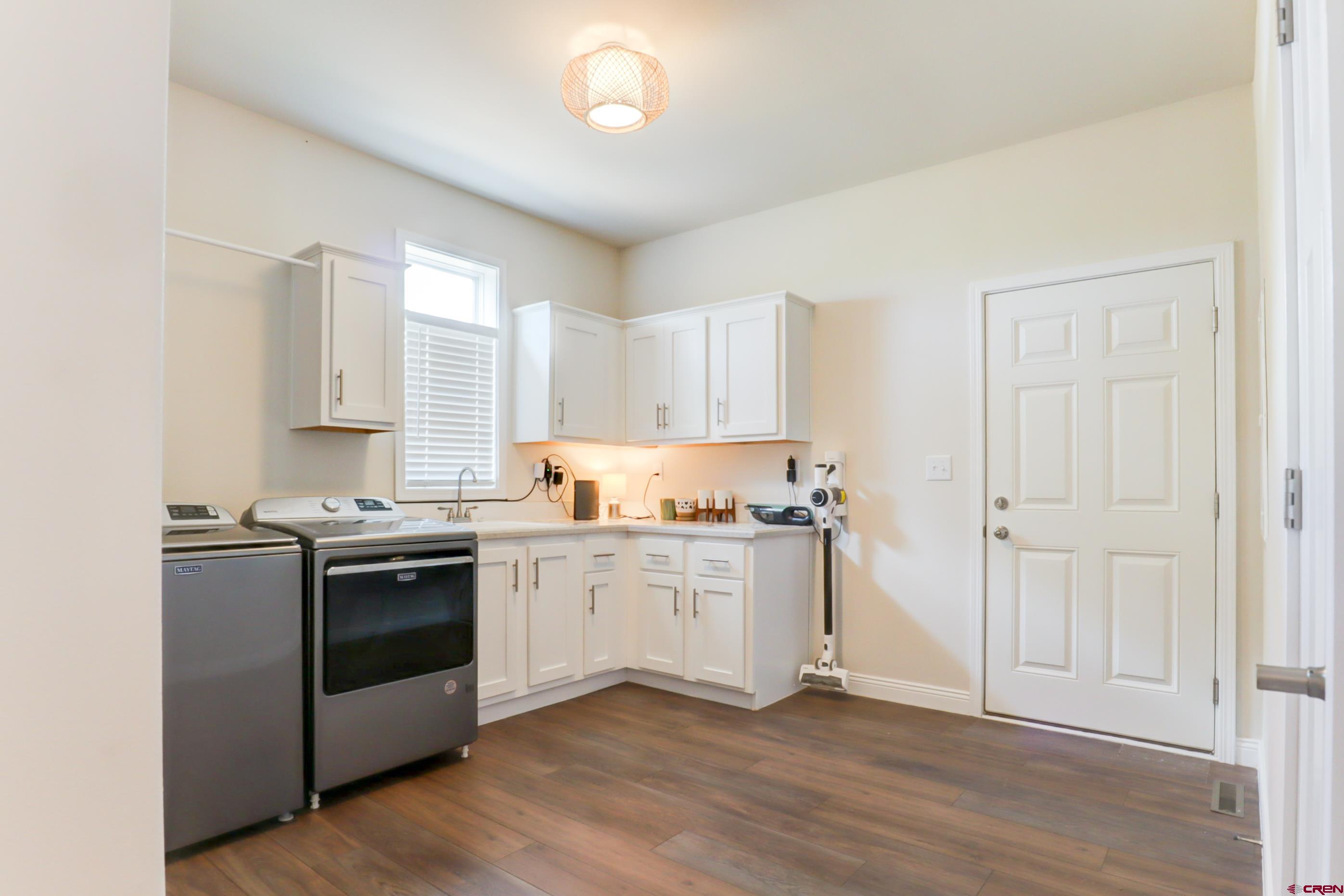 22667 Rd L Cortez, CO 81321 - Photo 22 of 35 a kitchen with stainless steel appliances granite countertop a stove and a sink