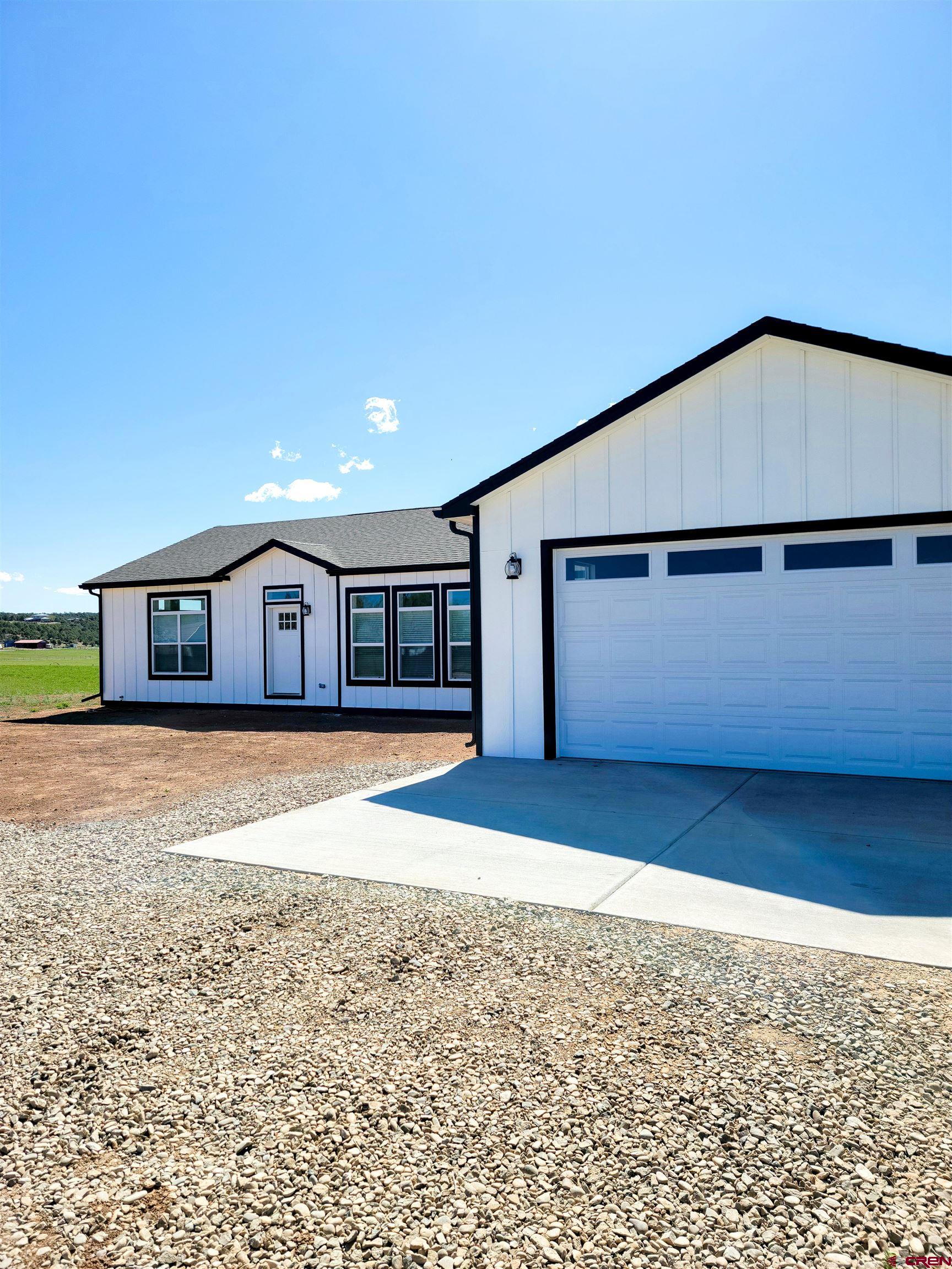 22667 Rd L Cortez, CO 81321 - Photo 26 of 35 a house view with a outdoor space