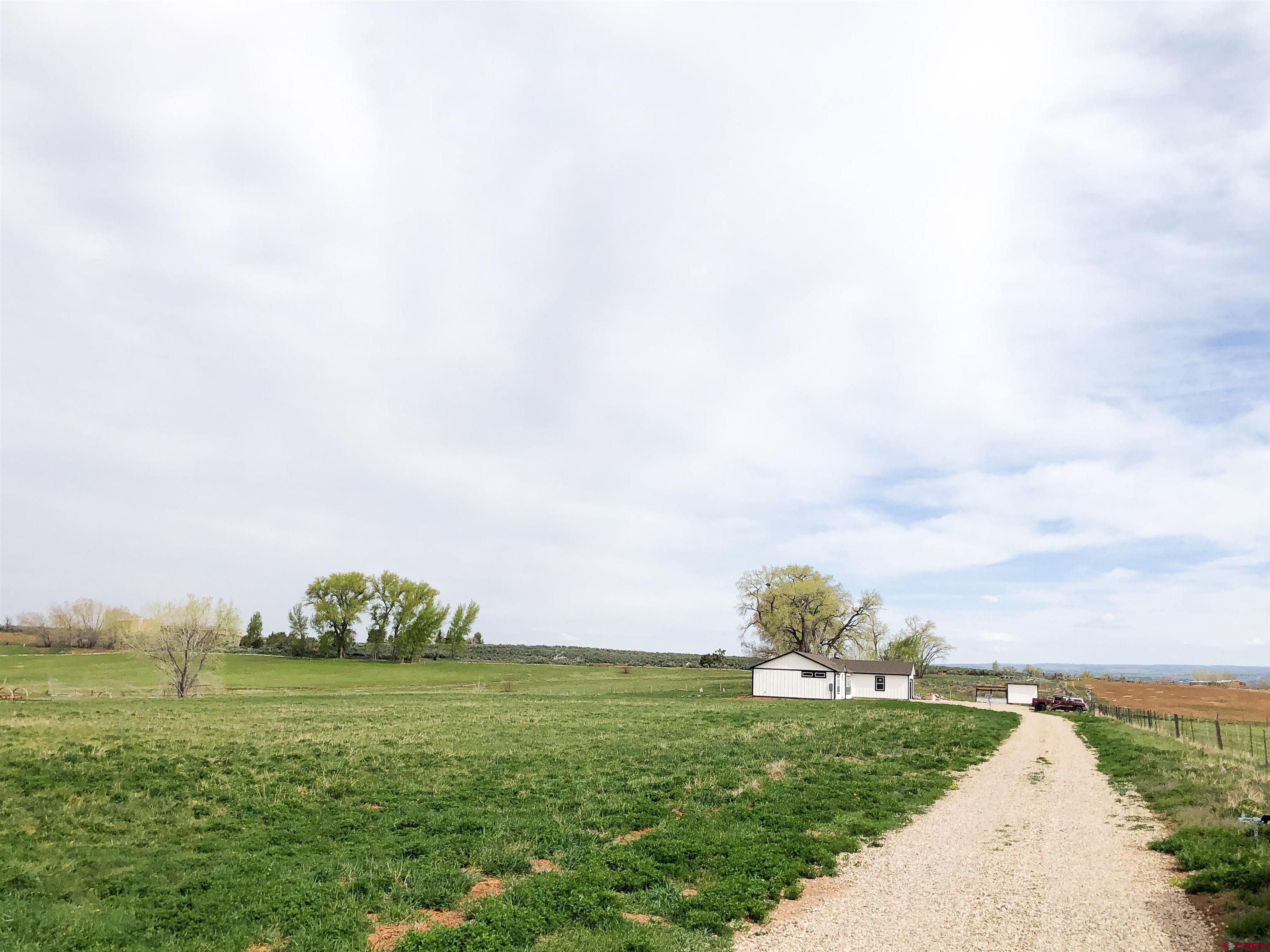 22667 Rd L Cortez, CO 81321 - Photo 33 of 35 a view of a field with an ocean
