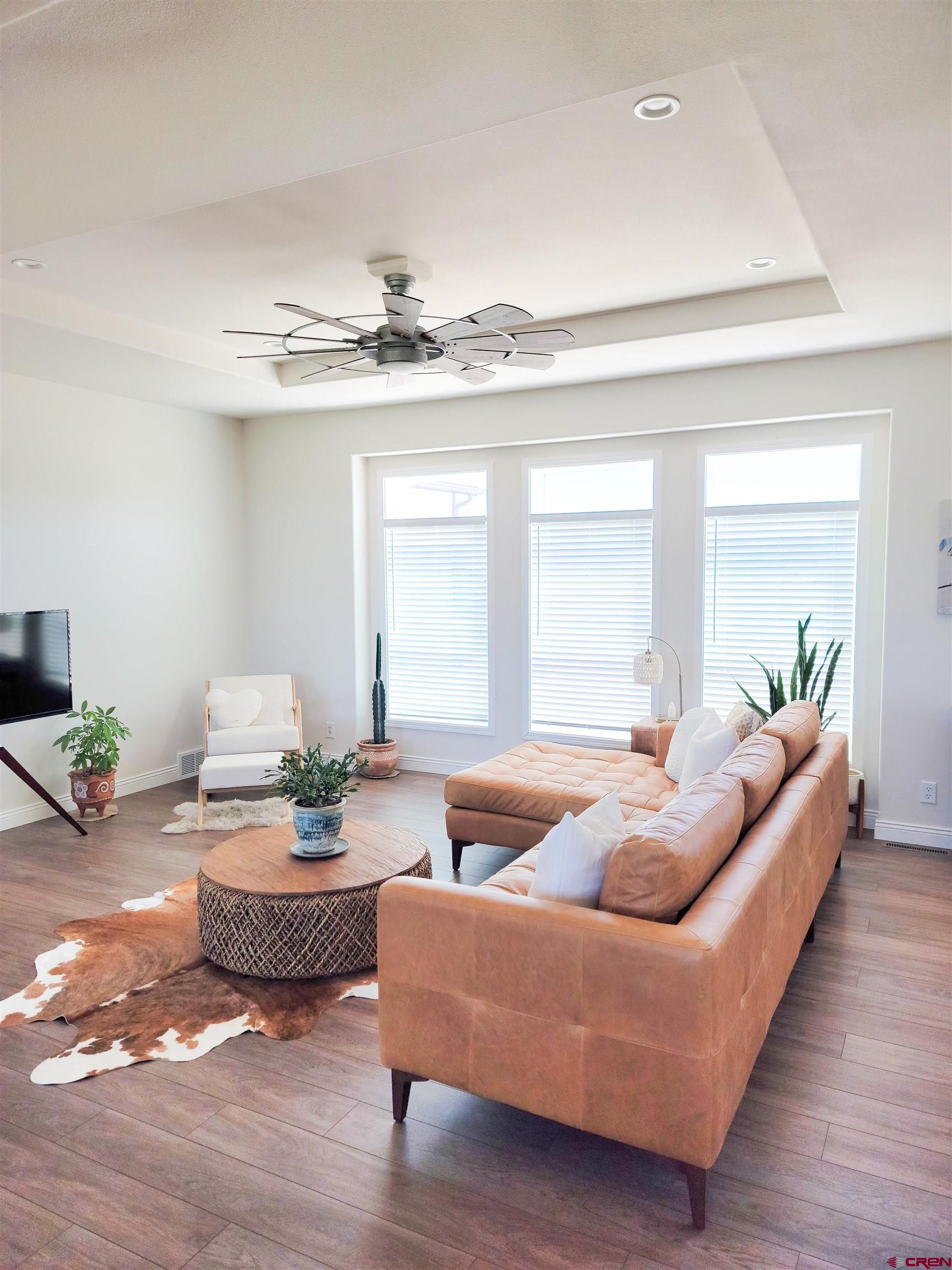 22667 Rd L Cortez, CO 81321 - Photo 4 of 35 a living room with furniture and a wooden floor