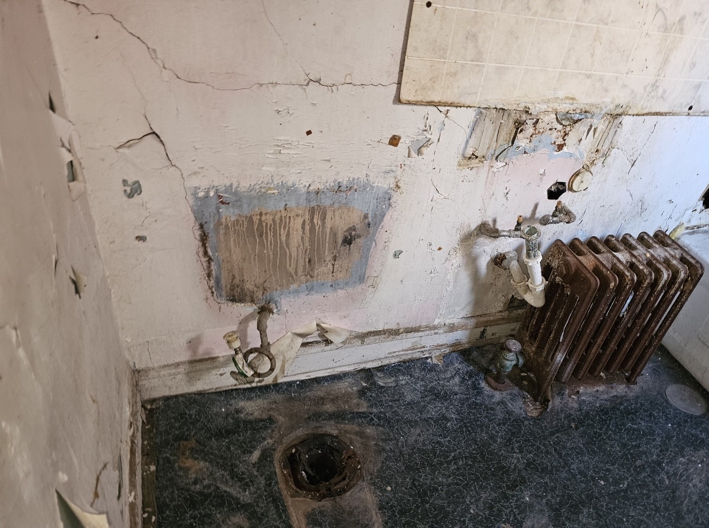 1650 South Ridgeway Avenue Chicago, IL 60623 - Photo 12 of 18 a bathroom with a granite countertop sink and a mirror