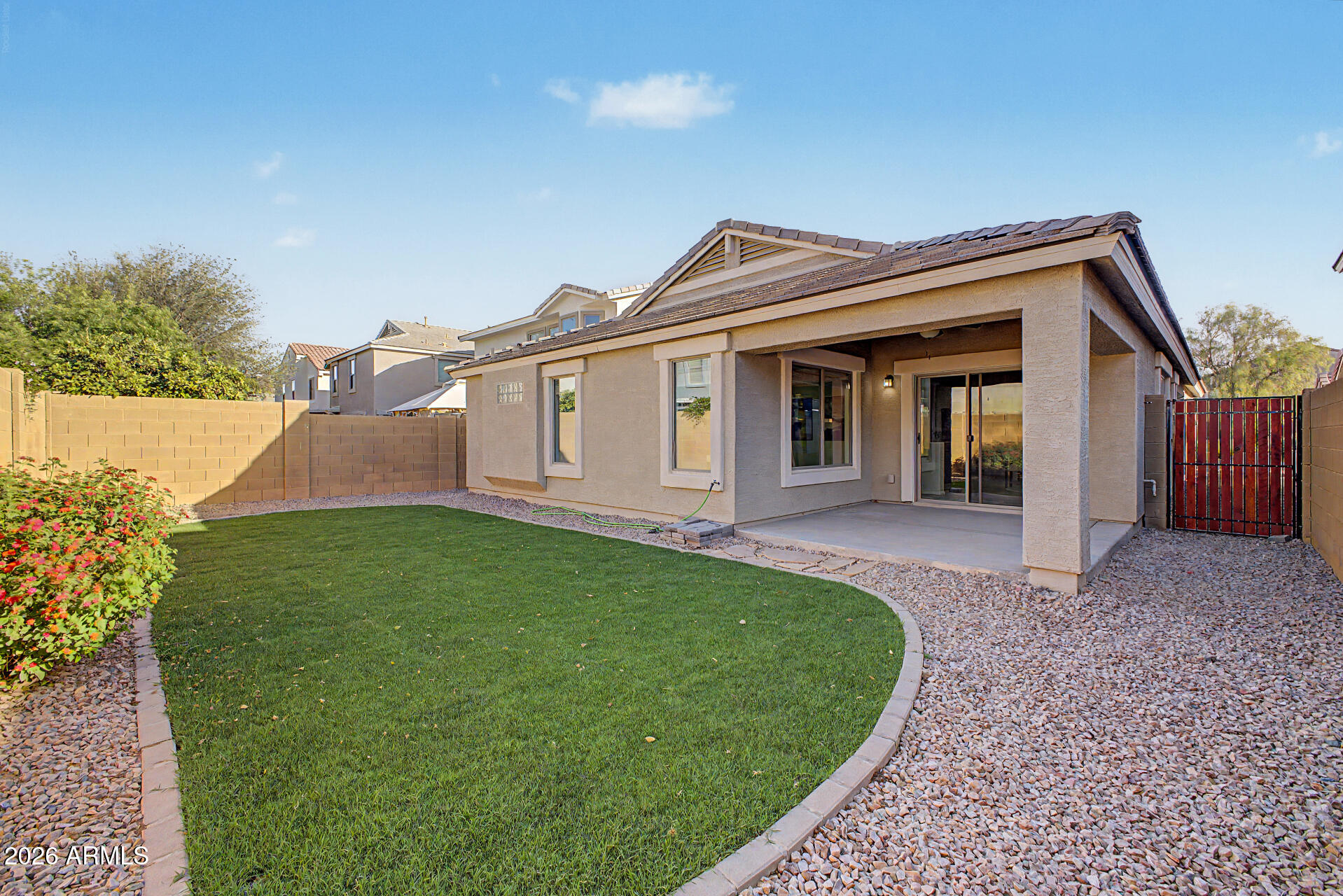 4168 East Sandy Way Gilbert, AZ 85297 - Photo 28 of 47 front view of a house with a yard