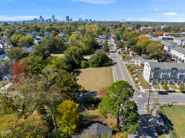an aerial view of a city with lots of residential buildings