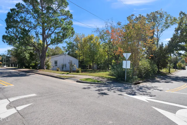 a view of street with houses