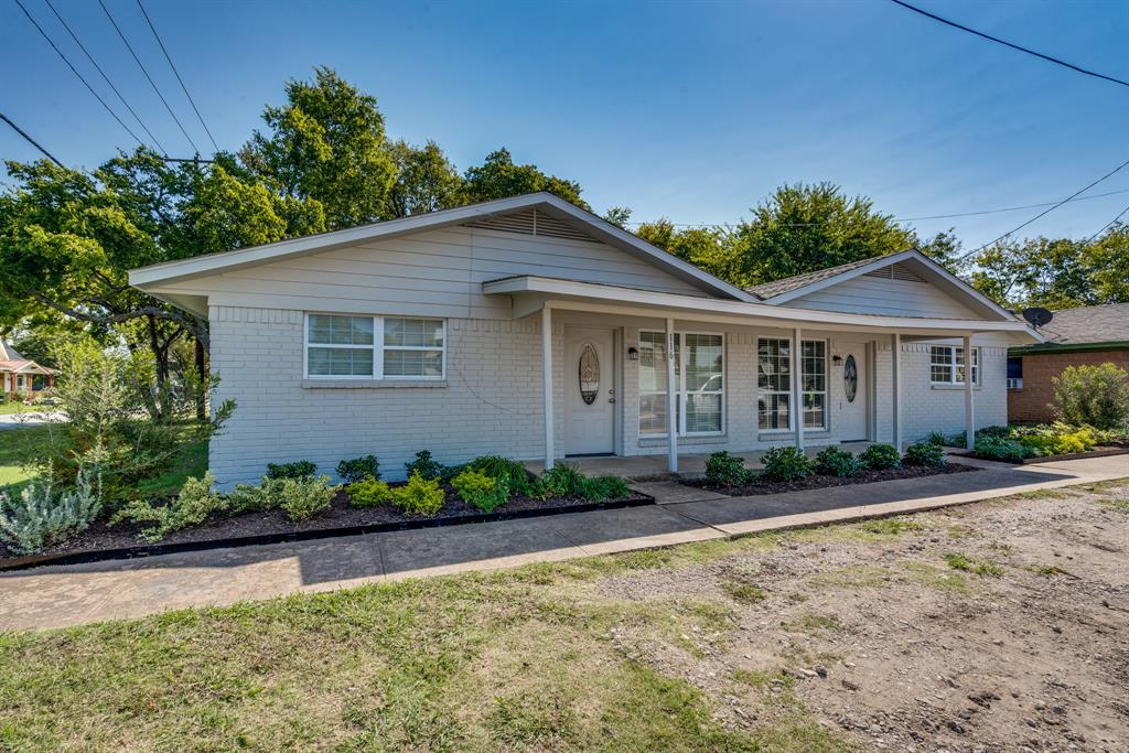 116 North 12th Street, Unit B Midlothian, TX 76065 - Photo 1 of 24 a front view of a house with a yard