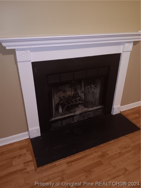 517 Woodwind Drive Spring Lake, NC 28390 - Photo 12 of 32 a living room with a fireplace