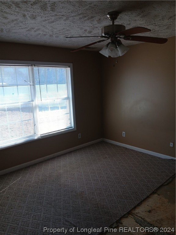 517 Woodwind Drive Spring Lake, NC 28390 - Photo 15 of 32 a view of an empty room with a window