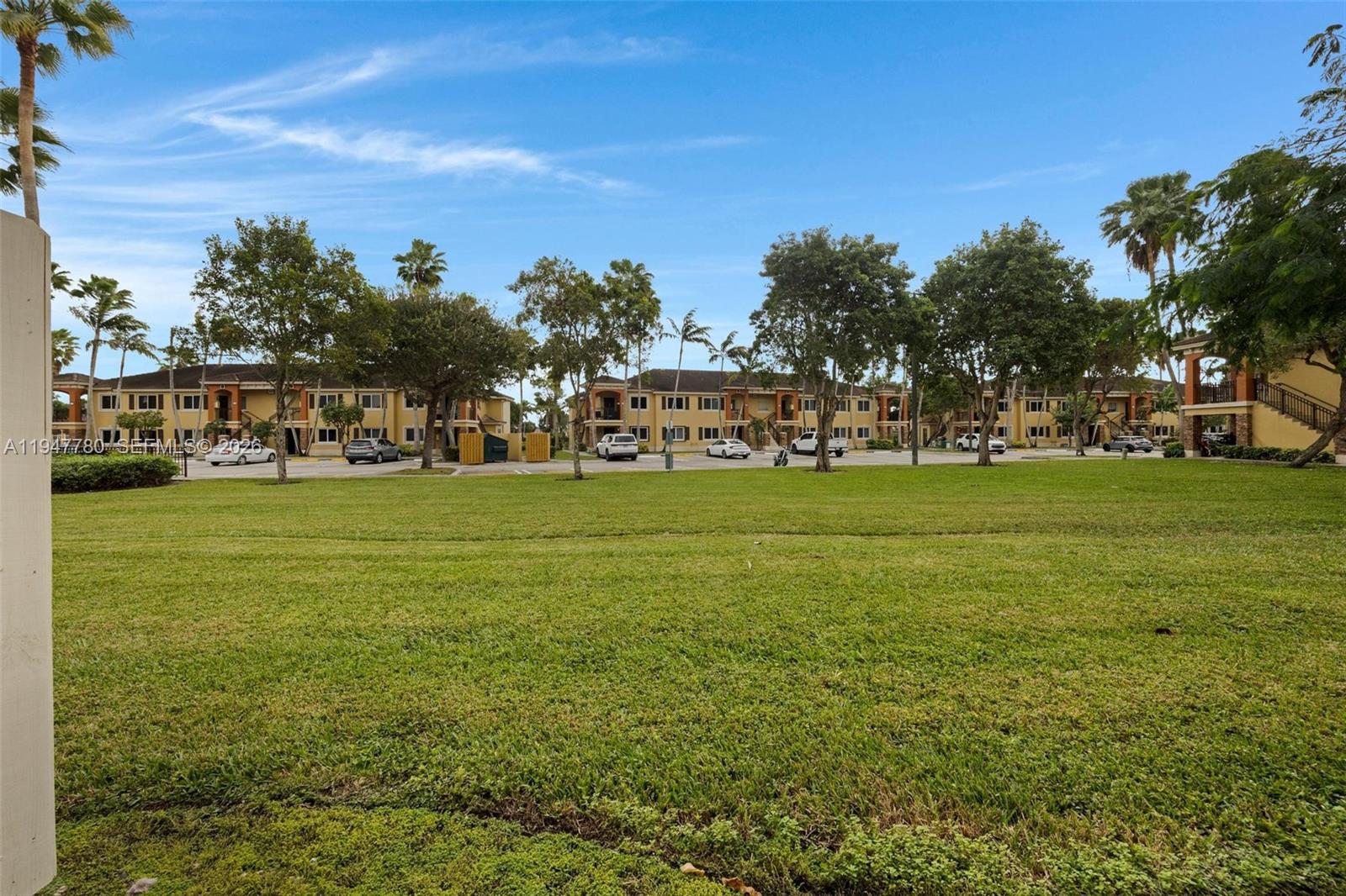 985 Northeast 33rd Terrace, Unit 102 Homestead, FL 33033 - Photo 20 of 20 a view of a park with houses