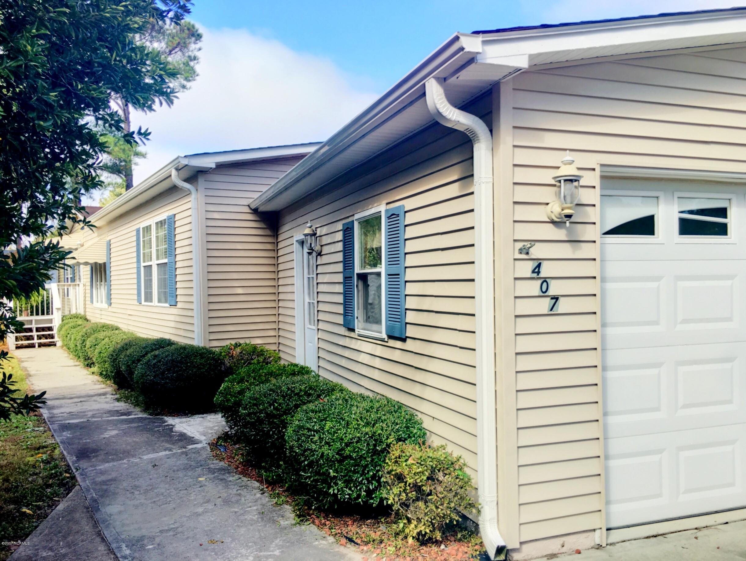 407 Quartermaster Court Hampstead, NC 28443 - Photo 2 of 25 Front 407 QM