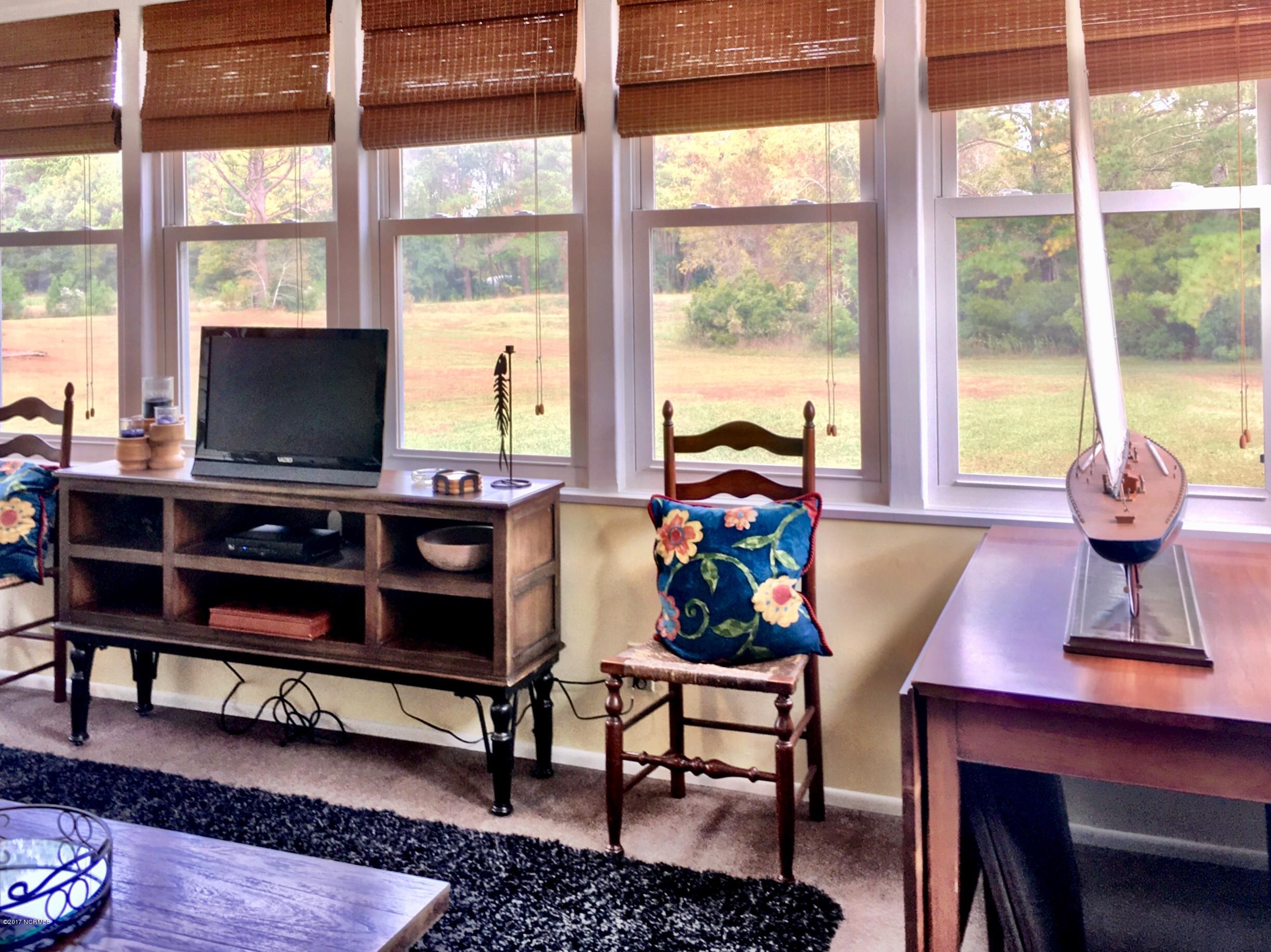 407 Quartermaster Court Hampstead, NC 28443 - Photo 6 of 25 Sunroom 1