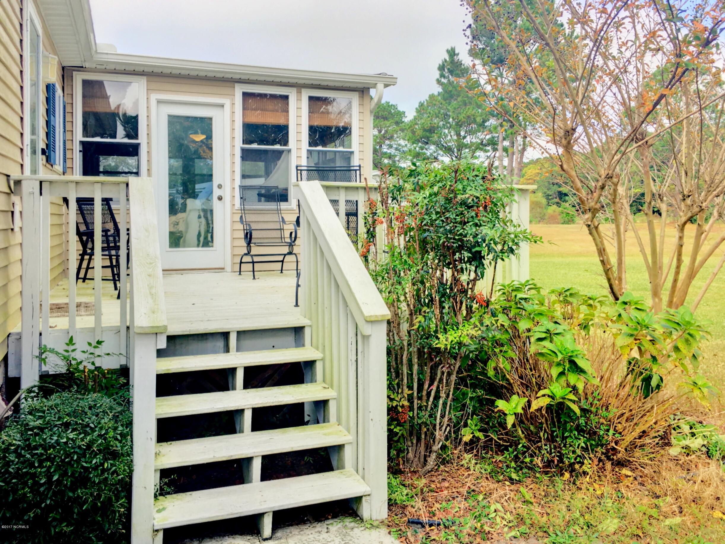 407 Quartermaster Court Hampstead, NC 28443 - Photo 7 of 25 Back Deck