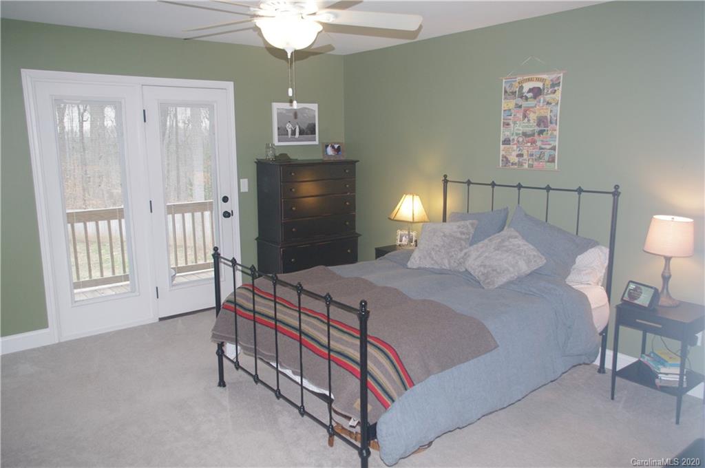 2958 Ranger Road Clover, SC 29710 - Photo 5 of 20 a bedroom with a bed and a lamp on dresser