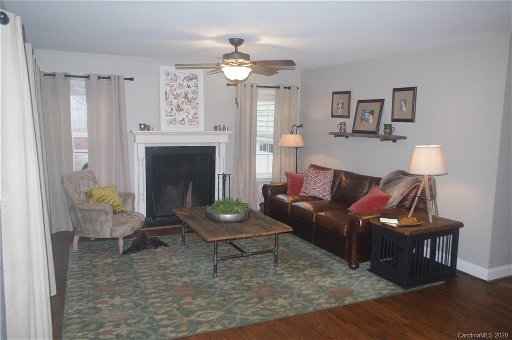 2958 Ranger Road Clover, SC 29710 - Photo 9 of 20 a living room with furniture a fireplace and a table