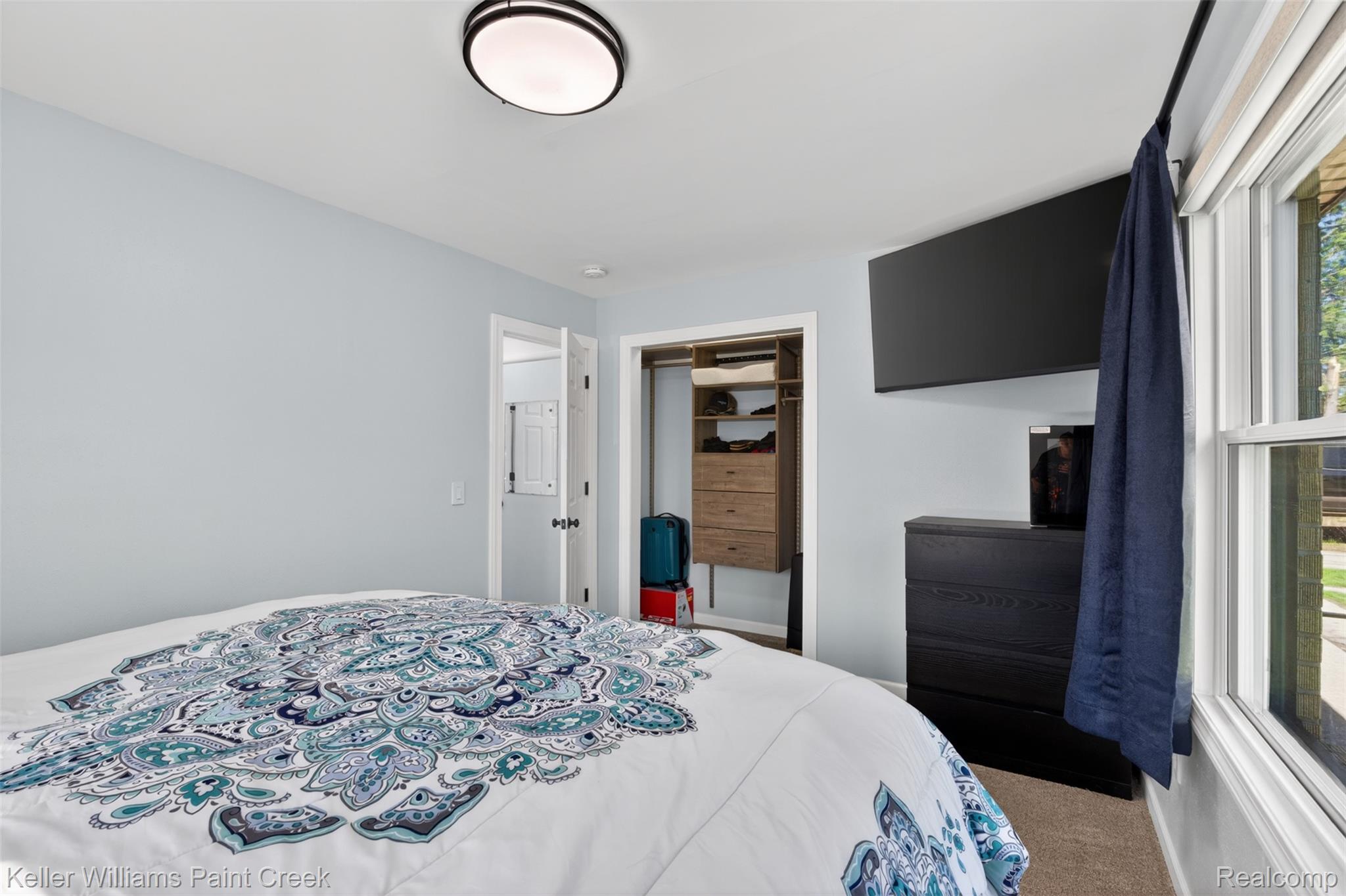 2942 Tatham Road Saginaw, MI 48601 - Photo 10 of 59 Bedroom with a closet and carpet floors