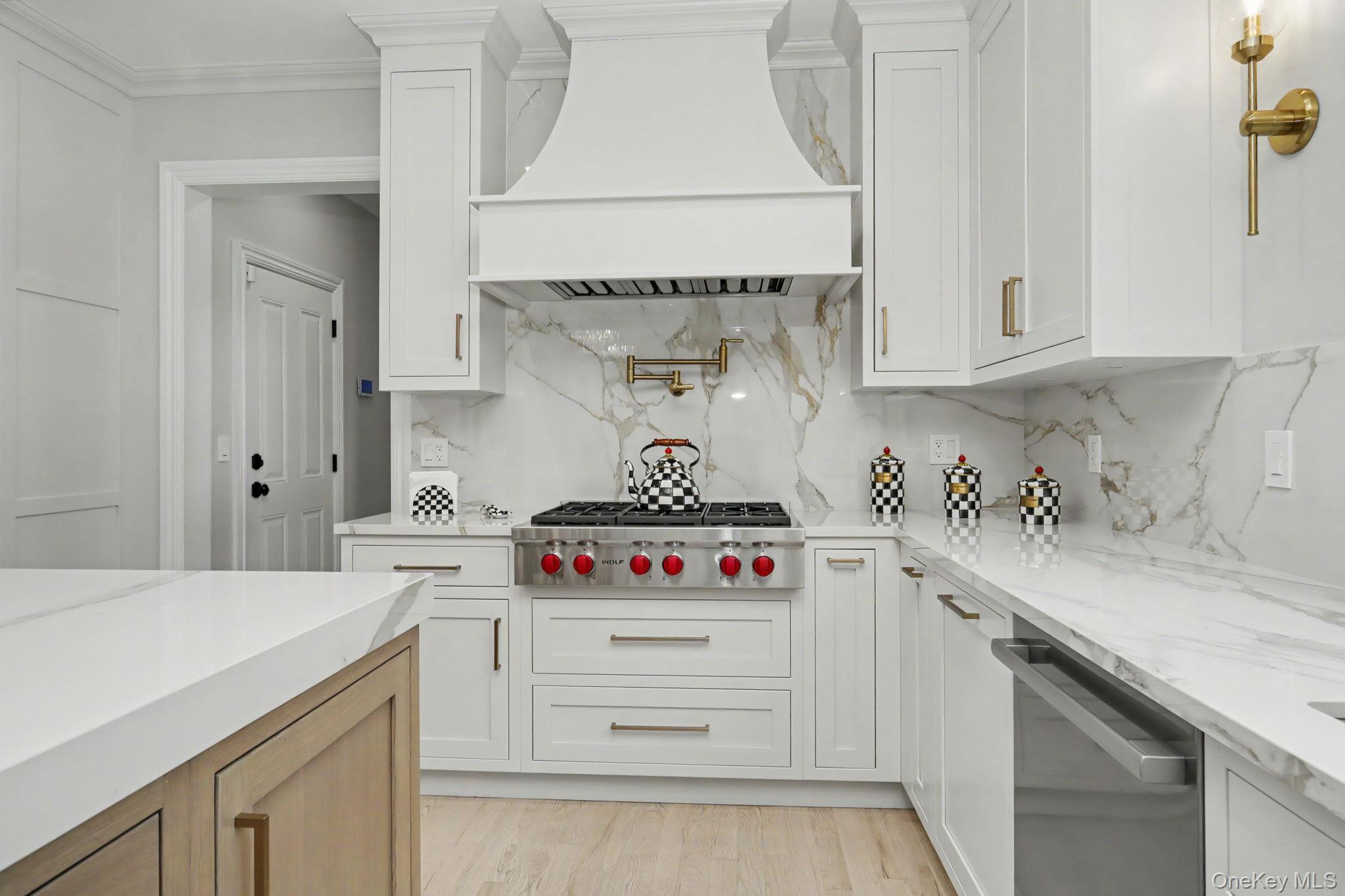 333 Lyncroft Road New Rochelle, NY 10804 - Photo 5 of 44 Custom design kitchen with Island and Sub-zero Refrigerator and Wolf appliances.