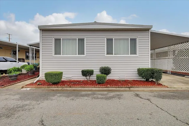 a front view of house with yard