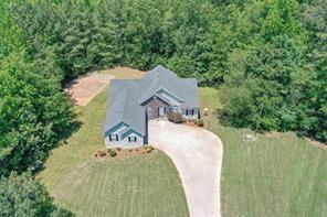 7387 Milam Road Winston, GA 30187 - Photo 39 of 41 a view of a house with a yard and a fountain