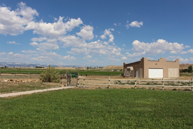 853 R Road Mack, CO 81525 - Photo 13 of 42 a view of a lake with houses in back