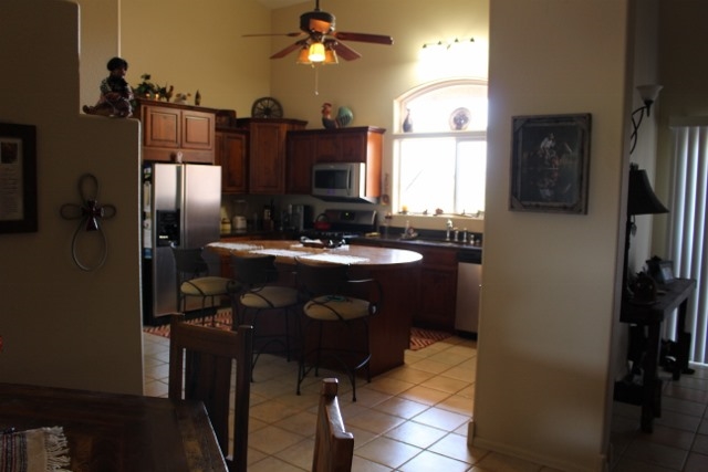 853 R Road Mack, CO 81525 - Photo 28 of 42 a kitchen with a sink refrigerator and microwave