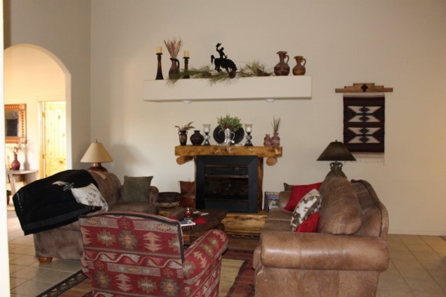 853 R Road Mack, CO 81525 - Photo 34 of 42 a living room with furniture a fireplace and window
