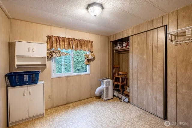 a view of an empty room with a window