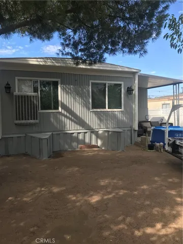 a view of a house with a patio