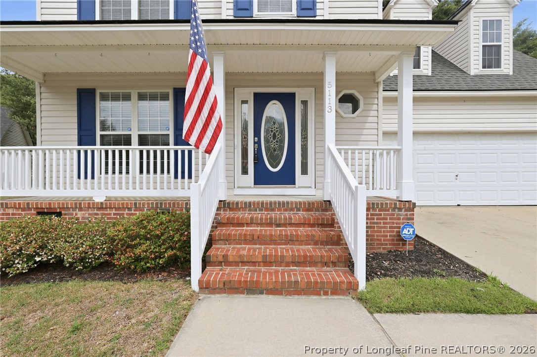 5113 Archer Road Hope Mills, NC 28348 - Photo 6 of 41 a view of entryway with a garden