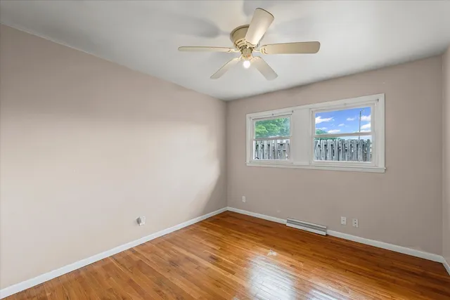 a view of backyard with a garden and entertaining space