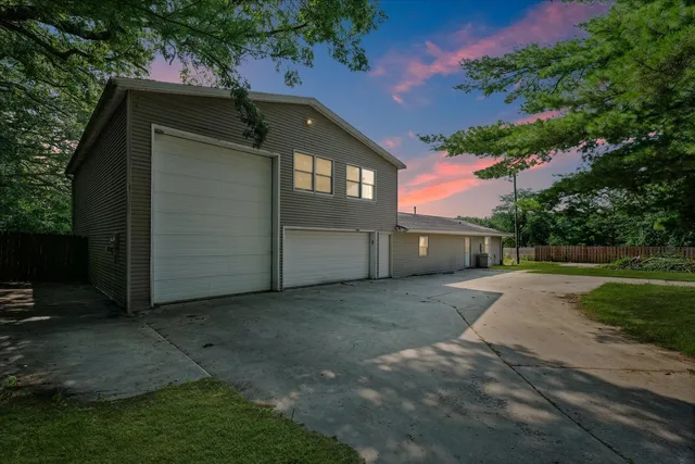 a view of a garden with a lake view