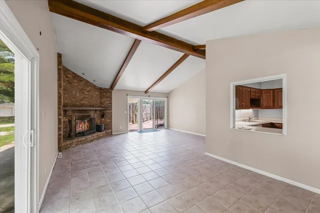a kitchen with stainless steel appliances a stove and a refrigerator