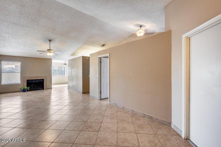 3339 West Mohawk Lane Phoenix, AZ 85027 - Photo 11 of 27 a view of a livingroom with an empty space and a fireplace