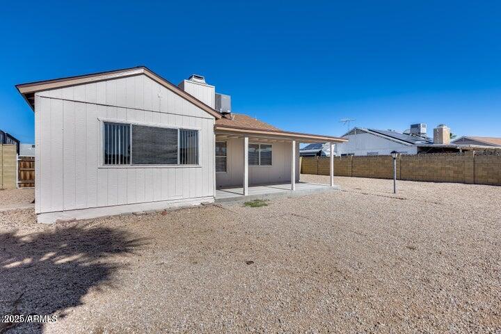 3339 West Mohawk Lane Phoenix, AZ 85027 - Photo 26 of 27 a front view of a house with a yard