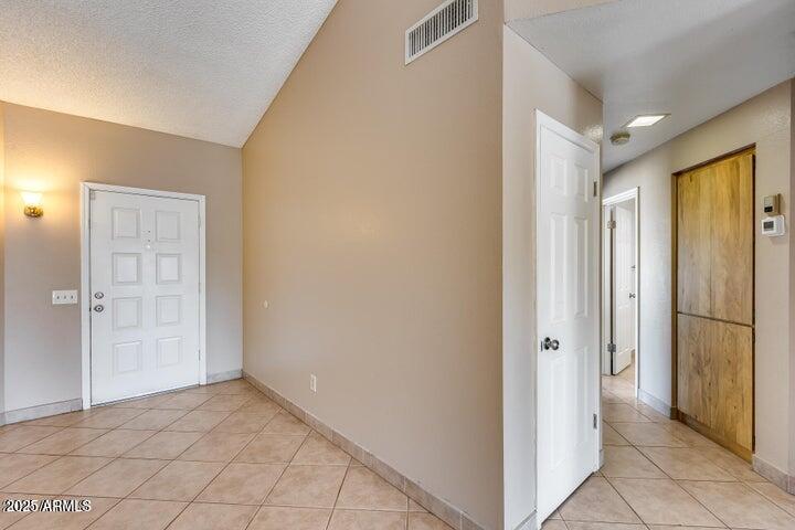 3339 West Mohawk Lane Phoenix, AZ 85027 - Photo 8 of 27 a view of a hallway with a hallway