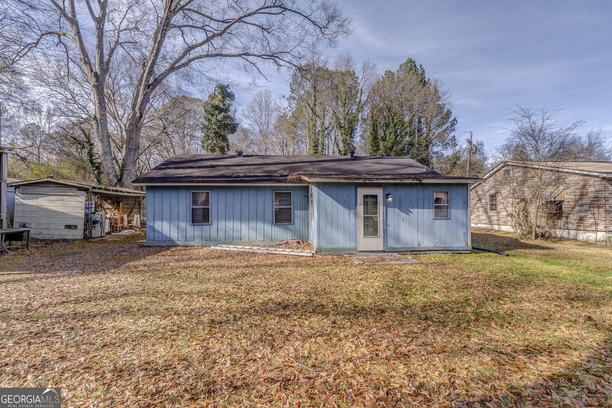 13 Kennemore Road Rome, GA 30165 - Photo 10 of 13 a front view of a house with a yard and garage