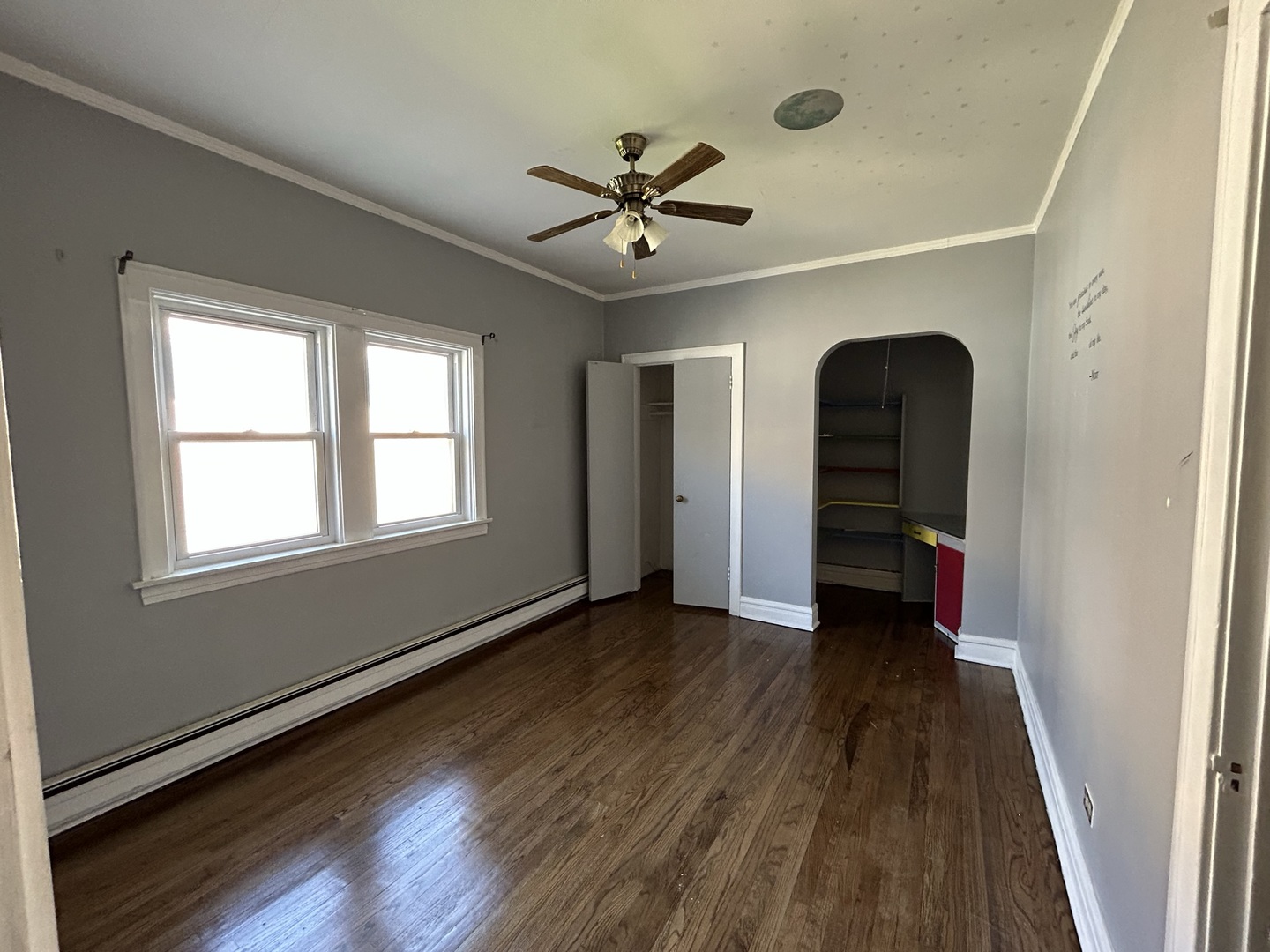 7904 45th Place Lyons, IL 60534 - Photo 8 of 26 wooden floor in an empty room with a window